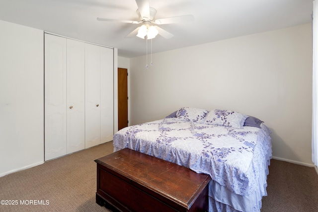 carpeted bedroom with ceiling fan, baseboards, and a closet