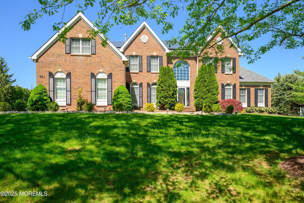 291 Round Hill Dr, Freehold, NJ 07728 - view of front of house featuring brick siding and entry steps