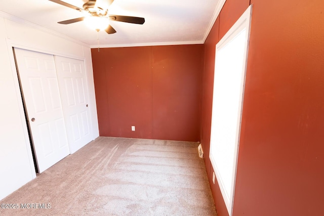89 Woodchuck Pkwy, Whiting, NJ 08759 - unfurnished bedroom with crown molding, a ceiling fan, carpet, and a closet