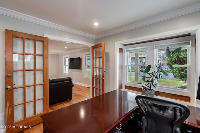 office featuring ornamental molding, baseboards, recessed lighting, french doors, and light wood finished floors
