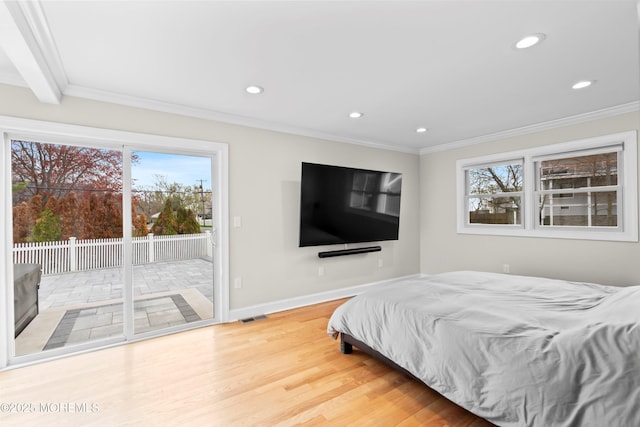 bedroom with access to outside, ornamental molding, and recessed lighting