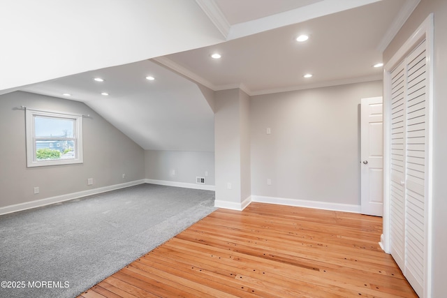 bonus room with recessed lighting, baseboards, and light wood-type flooring