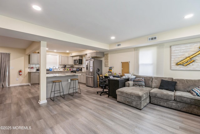 1603 Berkeley Ave, Beachwood, NJ 08722 - living room featuring light wood-style floors and recessed lighting