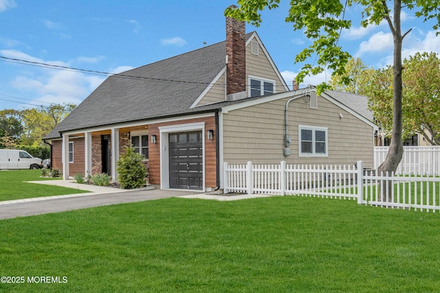 view of side of property with an attached garage, a chimney, driveway, and a shingled roof
