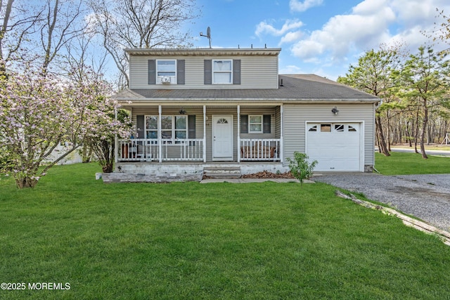 505 Albert Ave, Lakewood, NJ 08701 - traditional-style house featuring a porch, a garage, a front lawn, and driveway