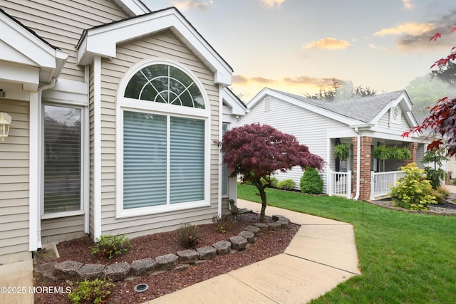 2271 Kira Ct, Toms River, NJ 08755 - view of property exterior with a yard and a porch