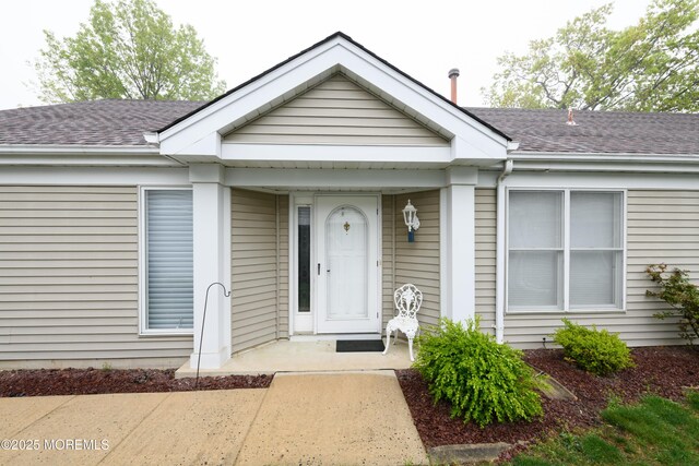 2271 Kira Ct, Toms River, NJ 08755 - entrance to property with a shingled roof