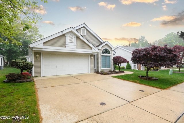 2271 Kira Ct, Toms River, NJ 08755 - view of front of home with concrete driveway, a yard, and an attached garage