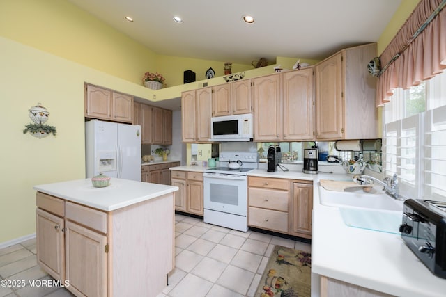 2271 Kira Ct, Toms River, NJ 08755 - kitchen featuring white appliances, light brown cabinetry, vaulted ceiling, light countertops, and recessed lighting