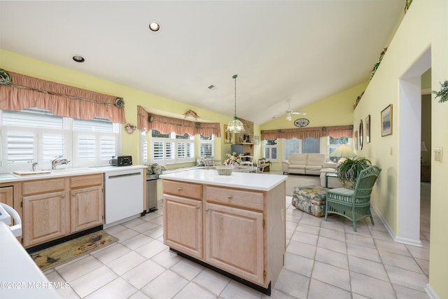 2271 Kira Ct, Toms River, NJ 08755 - kitchen with dishwasher, light brown cabinetry, a sink, light tile patterned floors, and lofted ceiling
