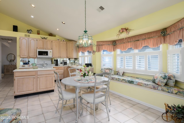 2271 Kira Ct, Toms River, NJ 08755 - kitchen featuring white appliances, light brown cabinetry, vaulted ceiling, light countertops, and a chandelier