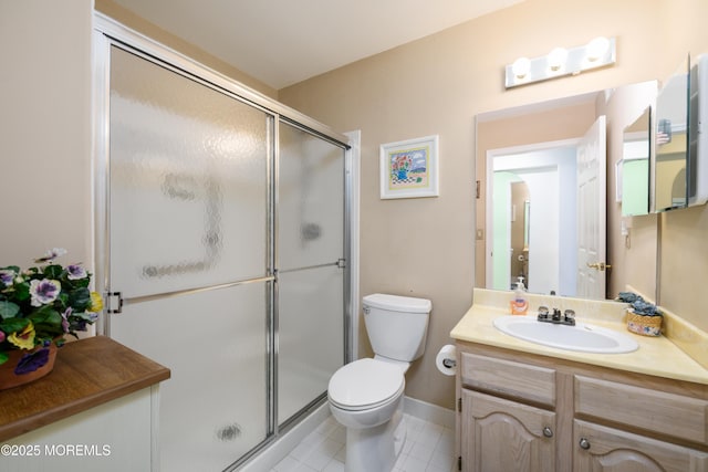 2271 Kira Ct, Toms River, NJ 08755 - bathroom featuring a shower stall, toilet, vanity, and tile patterned flooring