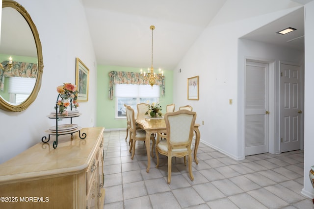 2271 Kira Ct, Toms River, NJ 08755 - dining area with vaulted ceiling, a chandelier, light tile patterned floors, and baseboards