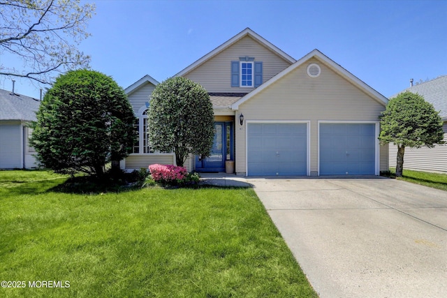 47 S Baker Dr, Jackson, NJ 08527 - view of front of home featuring driveway, a front yard, and a garage