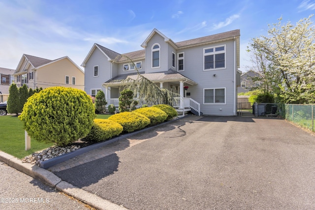 14 Dolan Ave, Aberdeen, NJ 07747 - victorian-style house featuring fence, a porch, and a residential view