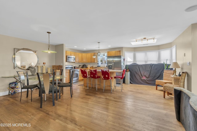 14 Dolan Ave, Aberdeen, NJ 07747 - dining room featuring recessed lighting, baseboards, and light wood-type flooring