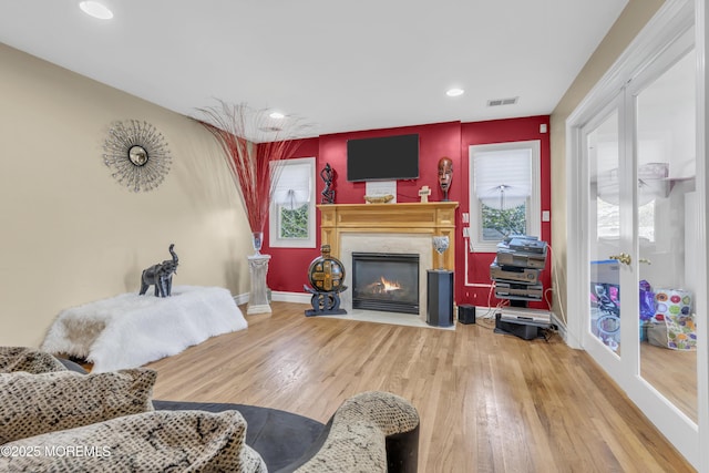 14 Dolan Ave, Aberdeen, NJ 07747 - living room featuring a fireplace, recessed lighting, baseboards, wood finished floors, and visible vents