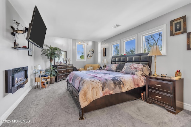 14 Dolan Ave, Aberdeen, NJ 07747 - bedroom with light colored carpet, baseboards, and visible vents