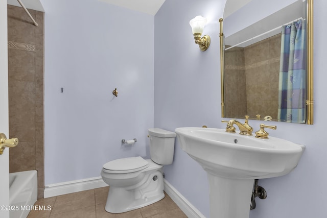 14 Dolan Ave, Aberdeen, NJ 07747 - bathroom with baseboards, tile patterned floors, shower / bath combination with curtain, and toilet