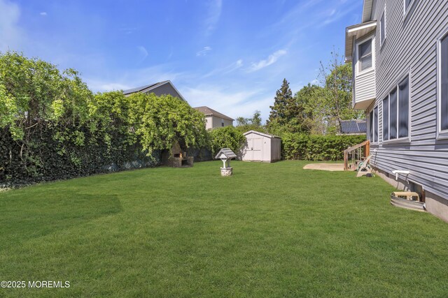 14 Dolan Ave, Aberdeen, NJ 07747 - view of yard featuring a storage unit and an outbuilding