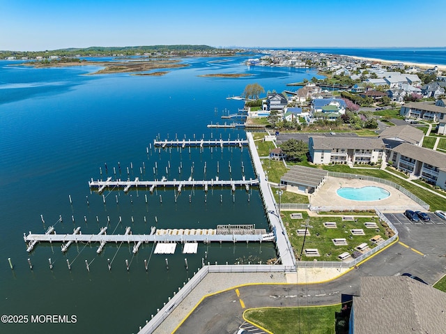 drone / aerial view featuring a water view