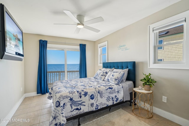 bedroom with light tile patterned flooring, access to exterior, baseboards, a water view, and a ceiling fan
