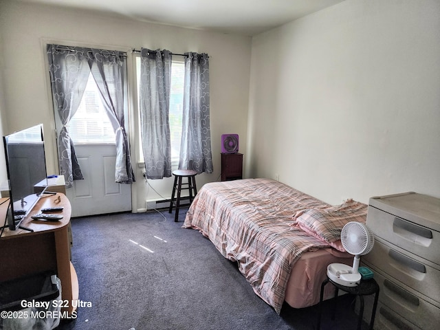 bedroom featuring carpet flooring and a baseboard radiator