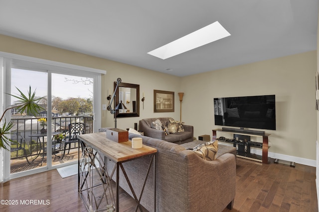 1606 Main St Unit R305, Belmar, NJ 07719 - living room featuring a skylight, dark wood finished floors, and baseboards