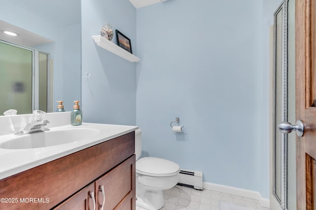full bath with a stall shower, vanity, tile patterned floors, a baseboard radiator, and toilet