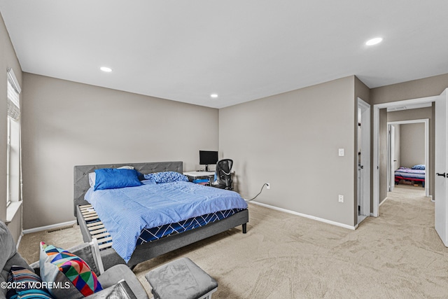 bedroom with recessed lighting, baseboards, and carpet