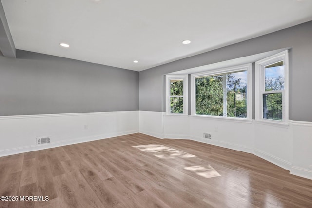 2338 Ramshorn Dr, Allenwood, NJ 08720 - empty room featuring recessed lighting, baseboards, visible vents, and light wood-style flooring