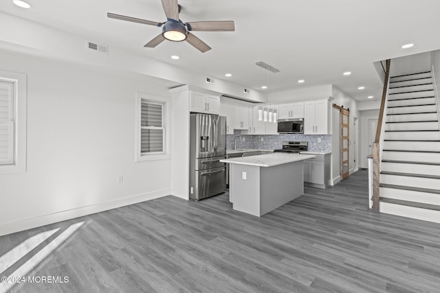 1501 Central, Seaside Heights, NJ 08751 - kitchen featuring stainless steel appliances, a sink, recessed lighting, ceiling fan, and a center island
