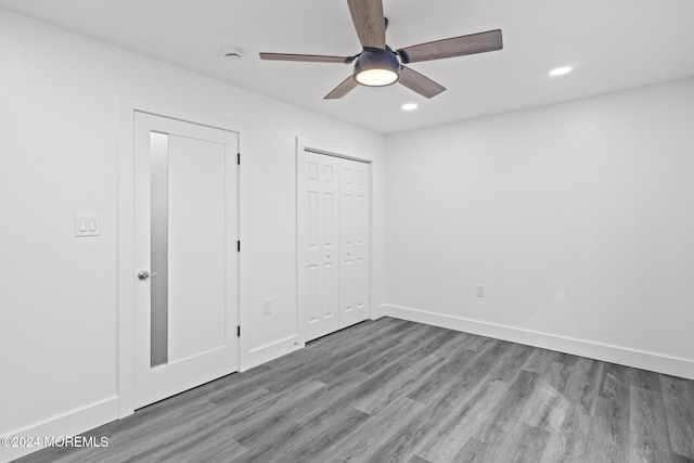 1501 Central, Seaside Heights, NJ 08751 - unfurnished bedroom with wood finished floors, recessed lighting, baseboards, a ceiling fan, and a closet