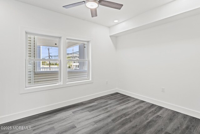 1501 Central, Seaside Heights, NJ 08751 - unfurnished room featuring dark wood-style flooring, baseboards, and ceiling fan