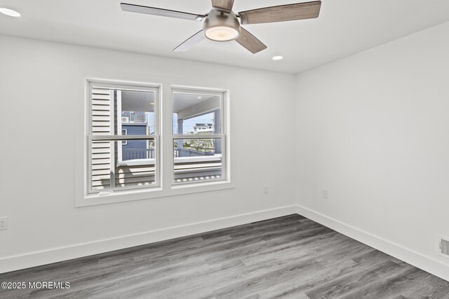 1501 Central, Seaside Heights, NJ 08751 - spare room with baseboards, wood finished floors, a ceiling fan, and recessed lighting