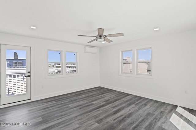 1501 Central, Seaside Heights, NJ 08751 - spare room with a wall mounted AC, plenty of natural light, a ceiling fan, dark wood finished floors, and recessed lighting