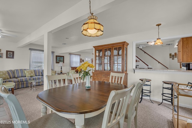 254 Butler Blvd, Bayville, NJ 08721 - dining space with stairway, baseboards, ceiling fan, and light colored carpet