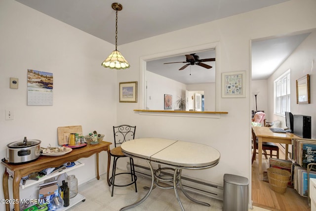 dining space with ceiling fan