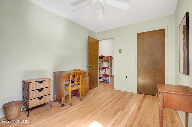 bedroom with ceiling fan and wood finished floors