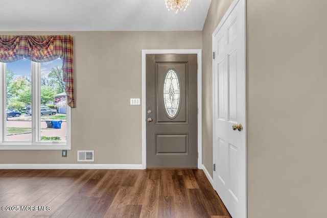 5 Beth Dr, Middletown, NJ 07748 - entrance foyer with baseboards, dark wood finished floors, a notable chandelier, and visible vents