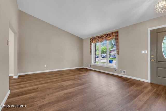 5 Beth Dr, Middletown, NJ 07748 - entryway featuring baseboards, lofted ceiling, wood finished floors, and visible vents