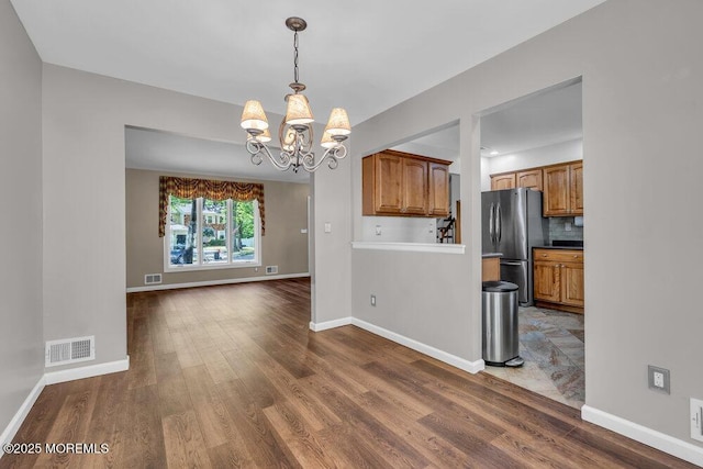 5 Beth Dr, Middletown, NJ 07748 - interior space with a chandelier, baseboards, visible vents, and wood finished floors