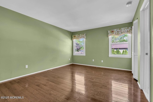 5 Beth Dr, Middletown, NJ 07748 - unfurnished bedroom featuring baseboards and wood finished floors