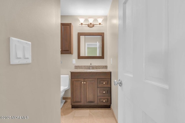 5 Beth Dr, Middletown, NJ 07748 - half bath featuring vanity, baseboards, a chandelier, and toilet