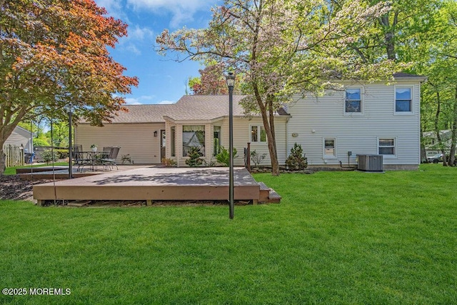 5 Beth Dr, Middletown, NJ 07748 - rear view of house with a lawn, central AC unit, and a deck