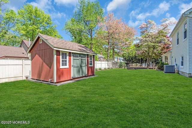 5 Beth Dr, Middletown, NJ 07748 - view of yard featuring a storage shed, an outdoor structure, cooling unit, and a fenced backyard