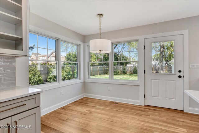 26 Rumson Pl, Little Silver, NJ 07739 - unfurnished dining area with baseboards, visible vents, and light wood-type flooring