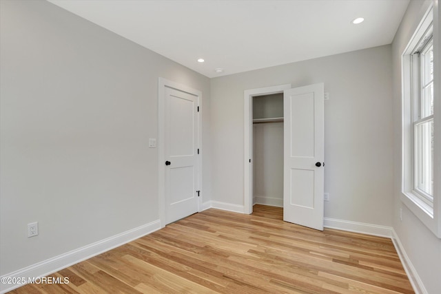 26 Rumson Pl, Little Silver, NJ 07739 - unfurnished bedroom featuring recessed lighting, baseboards, a closet, and light wood-style floors