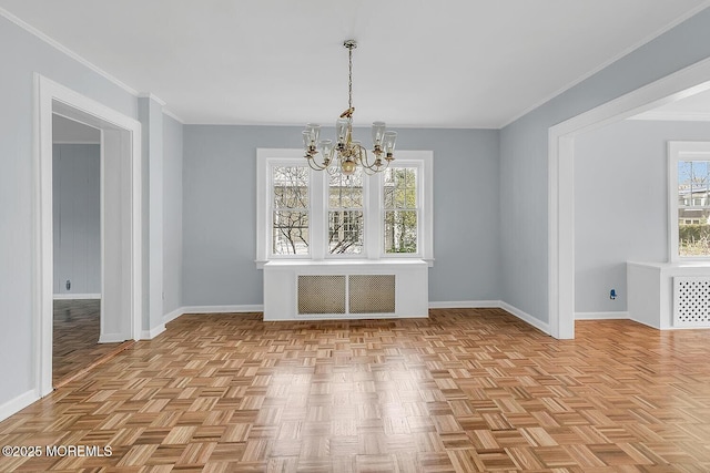 unfurnished dining area with baseboards, radiator heating unit, a chandelier, and a healthy amount of sunlight