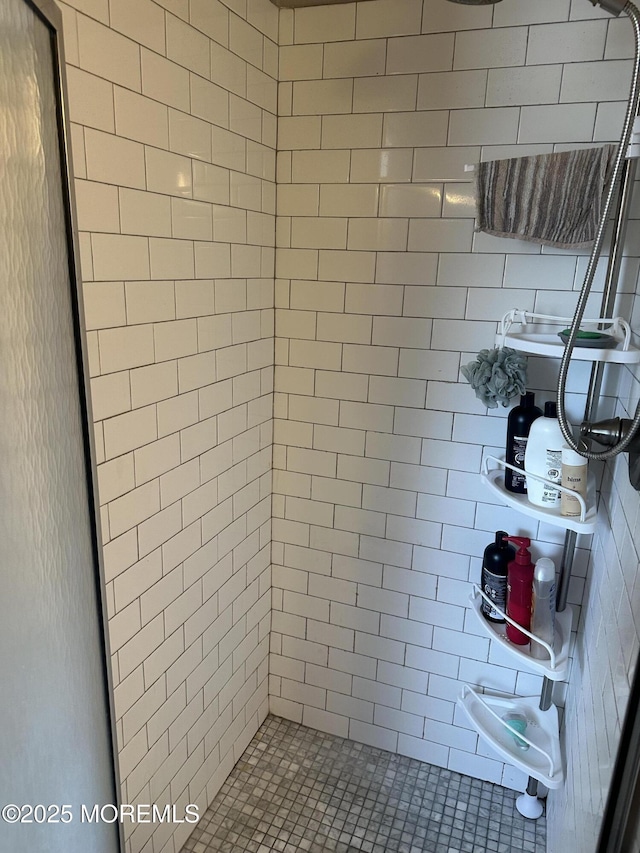 bathroom featuring a stall shower